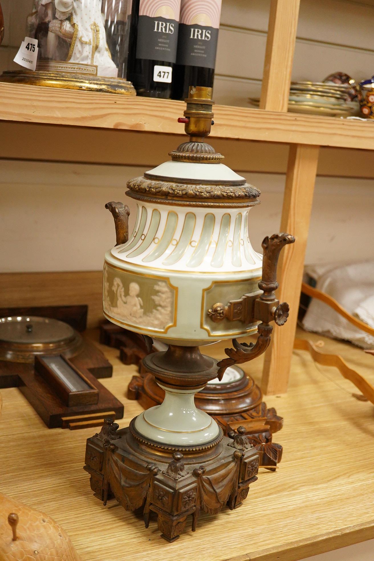 A French Sevres style porcelain and ormolu table lamp, with central decoration of a lyre amongst foliage, 49cm